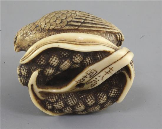 A Japanese ivory netsuke of two quails, 19th century, 3.8cm